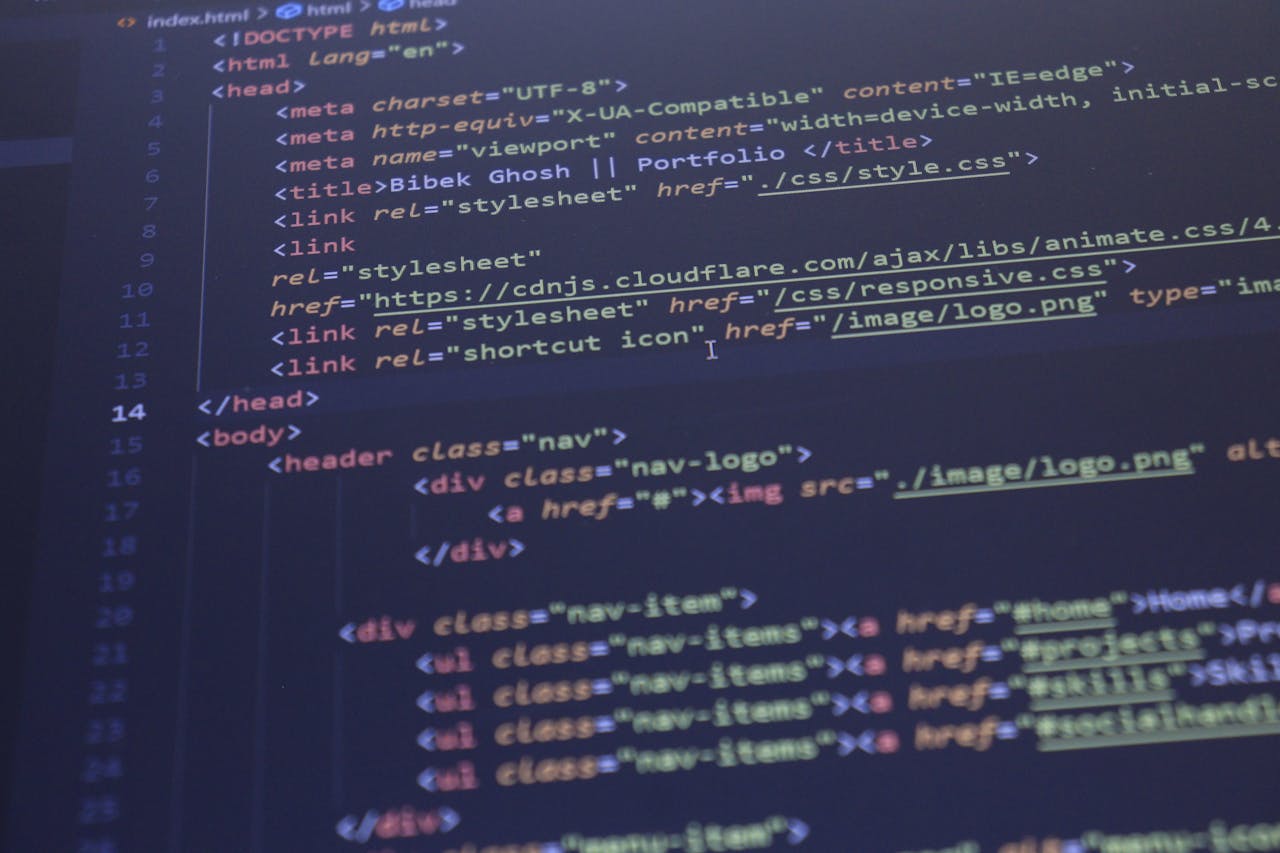 gallery-3 Close-up view of HTML and CSS code displayed on a computer screen, ideal for programming and technology themes.