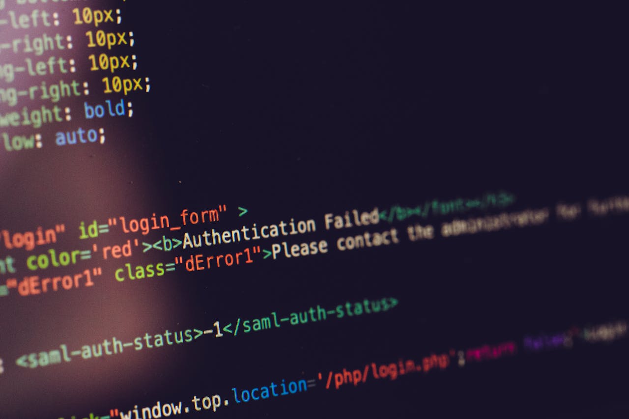 gallery-5 Close view of computer screen displaying HTML code with an authentication error.